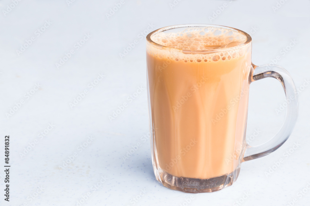 Tea with milk or popularly known as Teh Tarik in Malaysia Tea with milk or popularly known as Teh Tarik in Malaysia