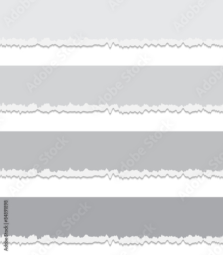 Grey torn papers