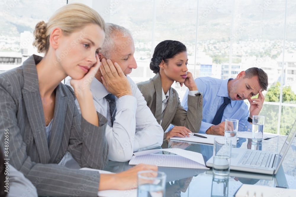 Fototapeta premium Tired business team at conference