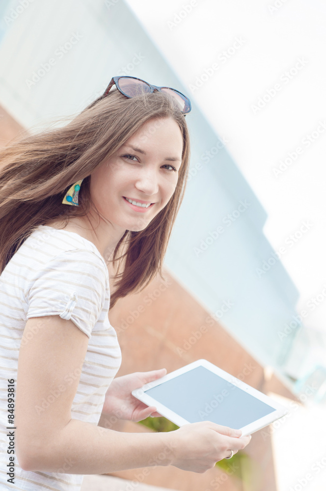 Young casual business woman using tablet on a break Young casual business woman using tablet on a break