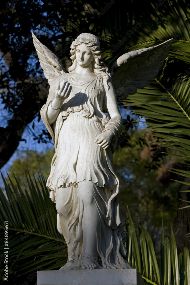 portrait of winged female marble statue