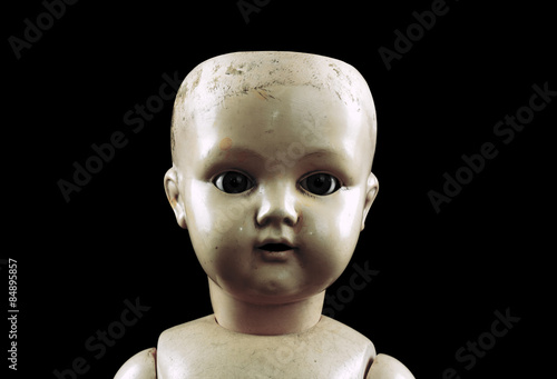 Fotografia Vintage doll face isolated on black with clipping path