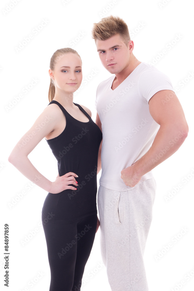 young man and woman posing in sportswear isolated on white young man and woman posing in sportswear isolated on white
