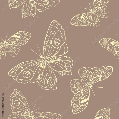 Seamless background with butterflies on beige background