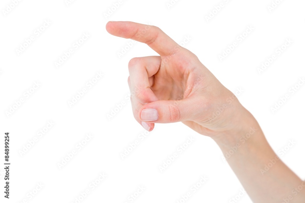 Woman pointing with her finger Woman pointing with her finger