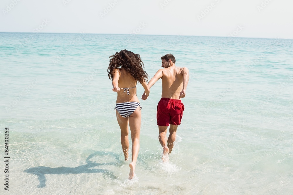 Couple running on the water 