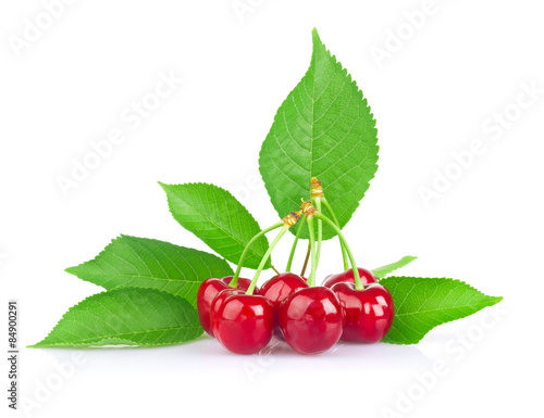 Ripe juicy cherry with green leaf. Isolated on white background