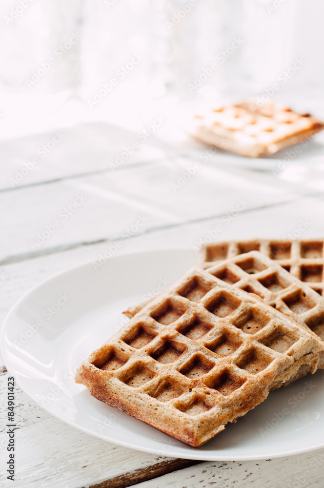 Breakfast with wholegrain waffles and whipped cream Breakfast with wholegrain waffles and whipped cream