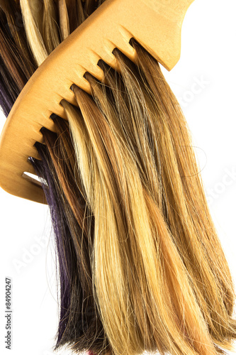 Wallpaper Mural  mèches de cheveux et peigne en bois sur fond blanc Torontodigital.ca