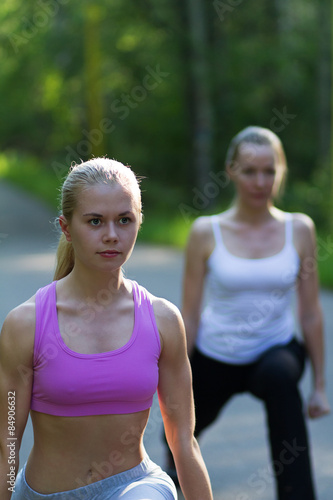 Fototapeta Naklejka Na Ścianę i Meble -  Girls are engaged in fitness