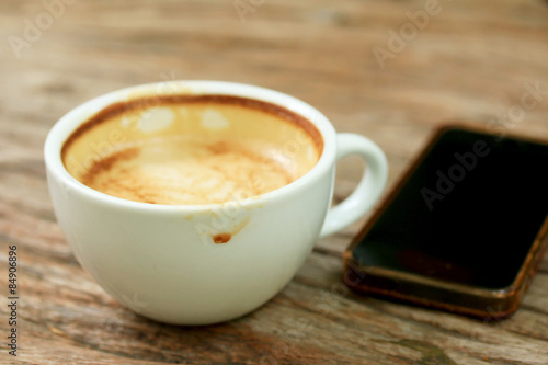 Dinking coffee with smart phone