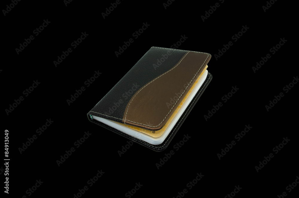 Notebook isolated on a black background