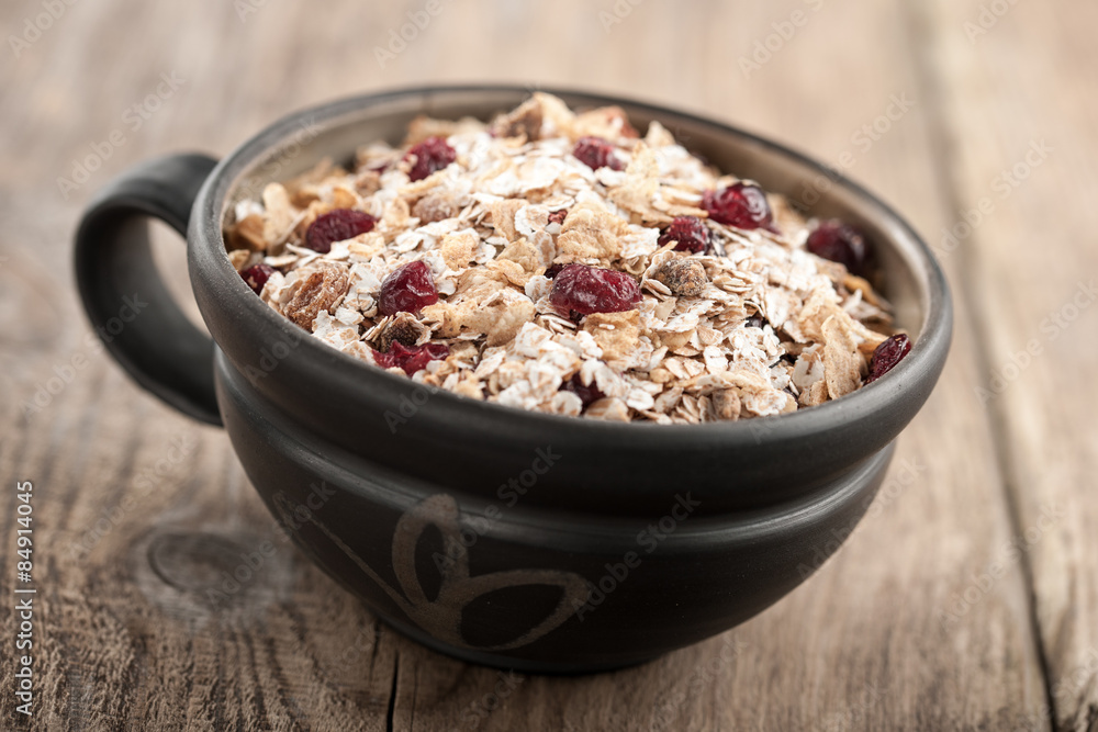 Organic muesli with berries in a bowl Organic muesli with berries in a bowl