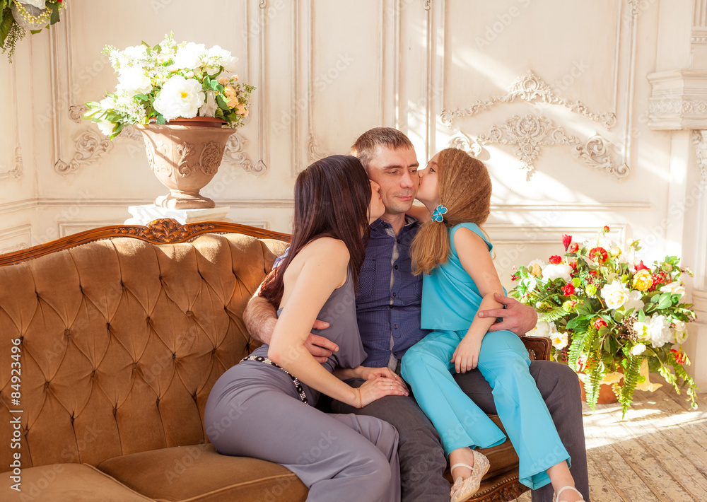 Happy family enjoying together on couch Happy family enjoying together on couch
