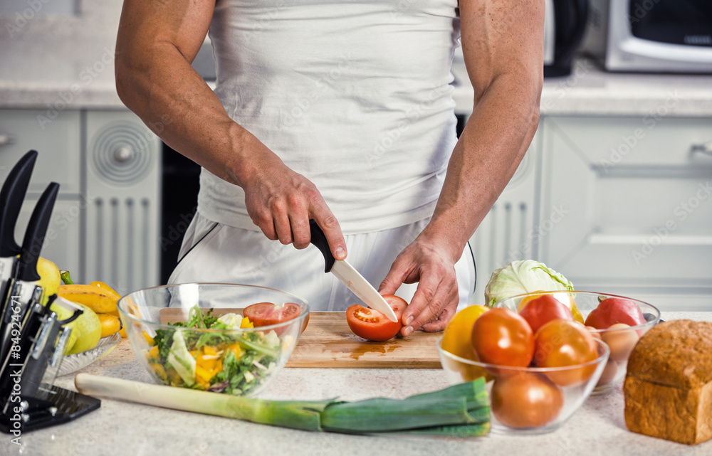 man cutting vegetables man cutting vegetables