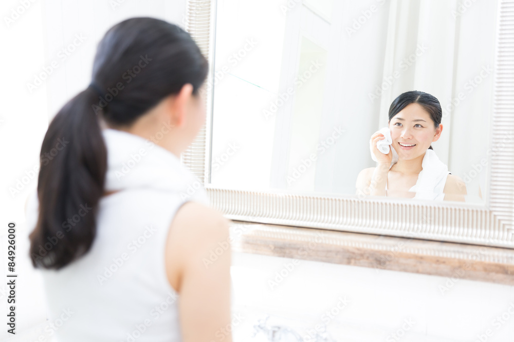 young asian woman in bathroom young asian woman in bathroom