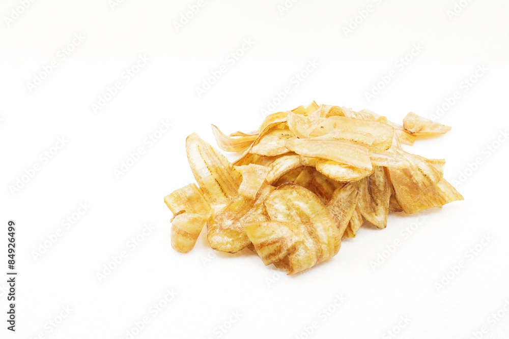 Isolated pile of banana chips Isolated pile of banana chips