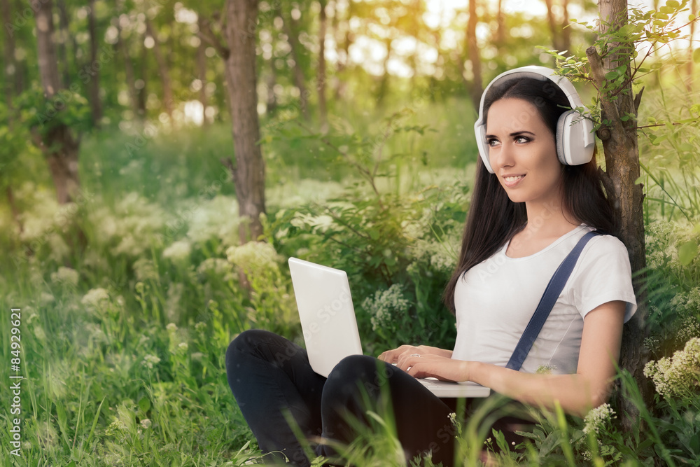 Girl with Headphones and Laptop
Girl with Headphones and Laptop