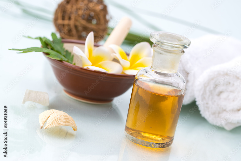Spa concept with handmade herb, Flowers, leaf, essential oil and Spa concept with handmade herb, Flowers, leaf, essential oil and