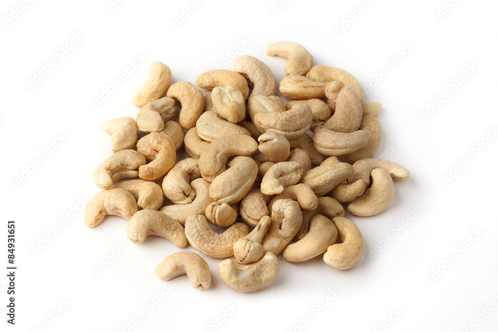 cashew nut pile on white bakground cashew nut pile on white bakground
