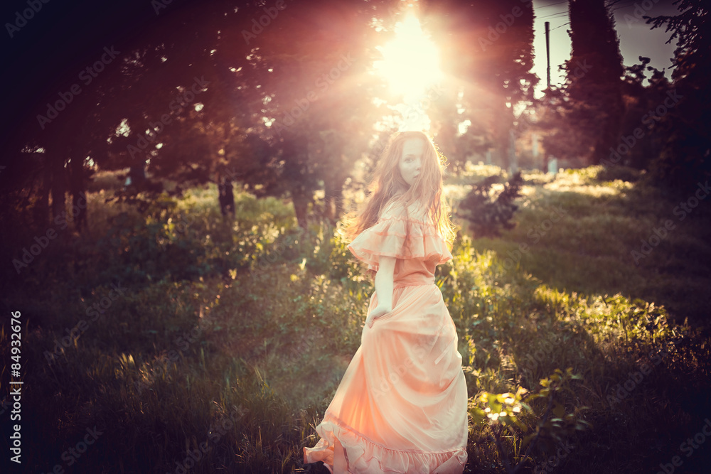 Beautiful women enjoying lilac garden, young women with flowers Beautiful women enjoying lilac garden, young women with flowers