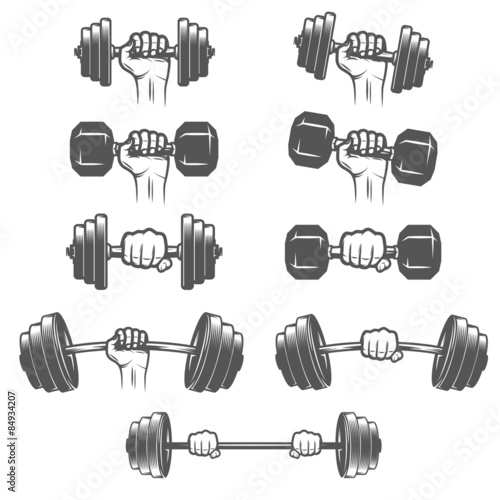 Set of vintage hands with dumbbells 