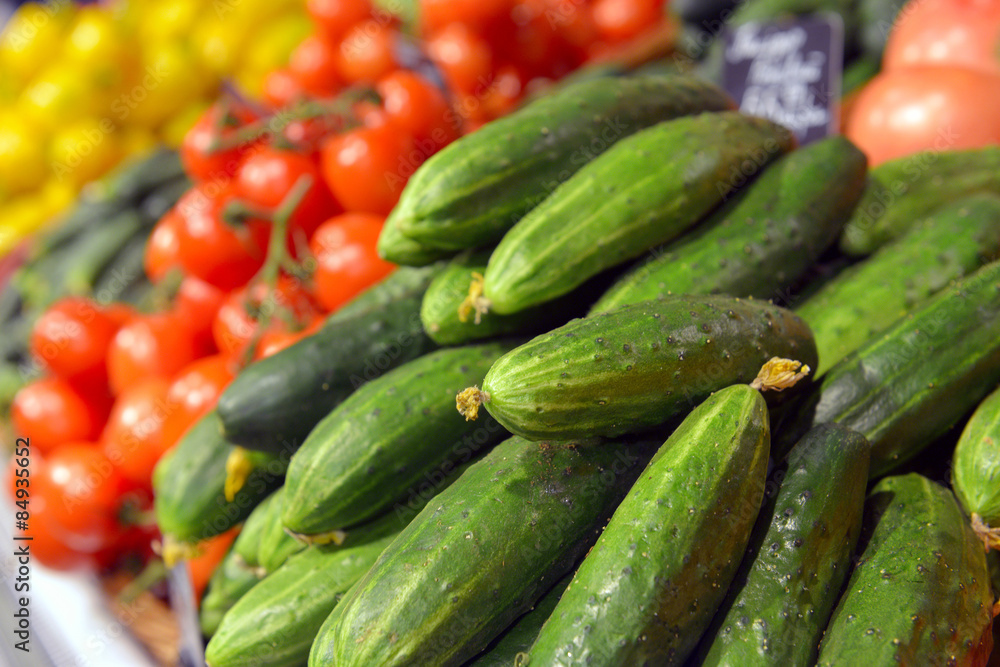 Cucumbers on display in a supermarket Cucumbers on display in a supermarket