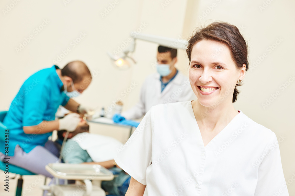 Fototapeta premium smiling dentist female doctor