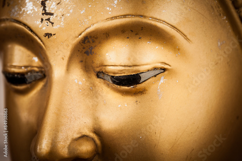 closeup eyes golden buddha