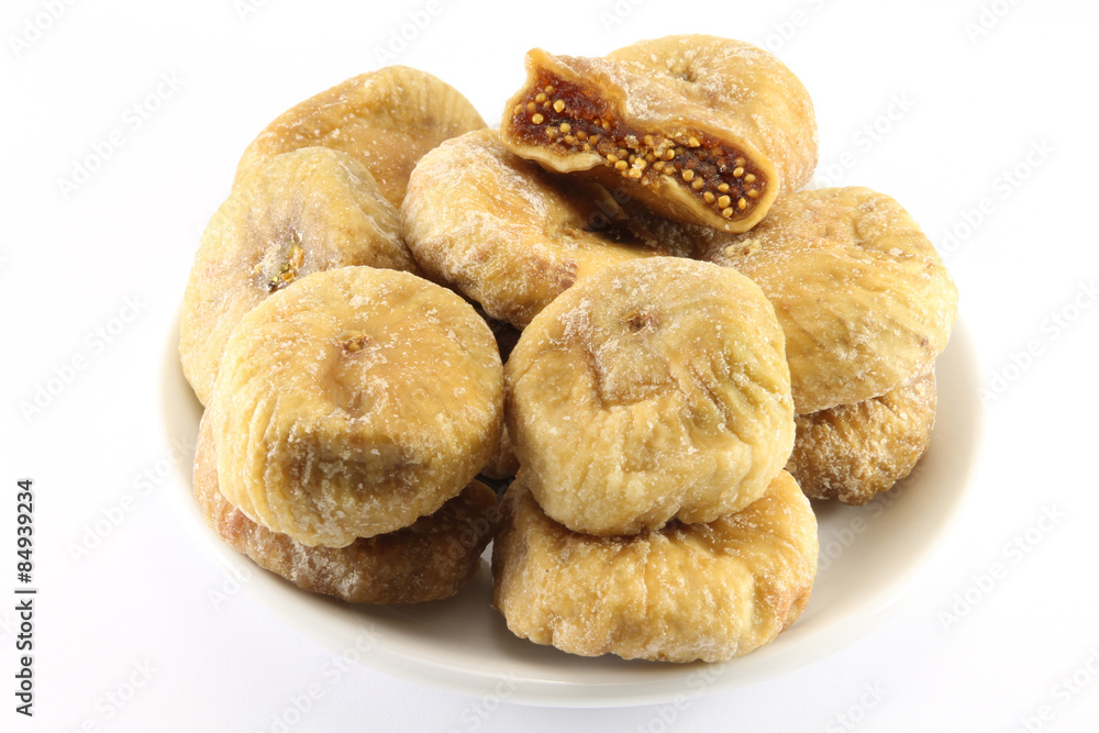 Dried figs on a round saucer