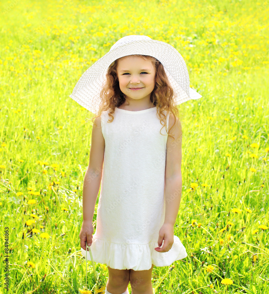Sunny portrait of little girl child outdoors on the meadow with Sunny portrait of little girl child outdoors on the meadow with