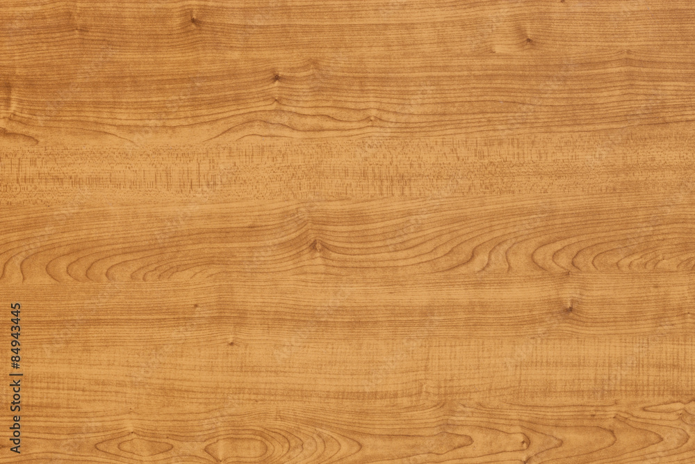 Background of a wooden table surface with fine texture.