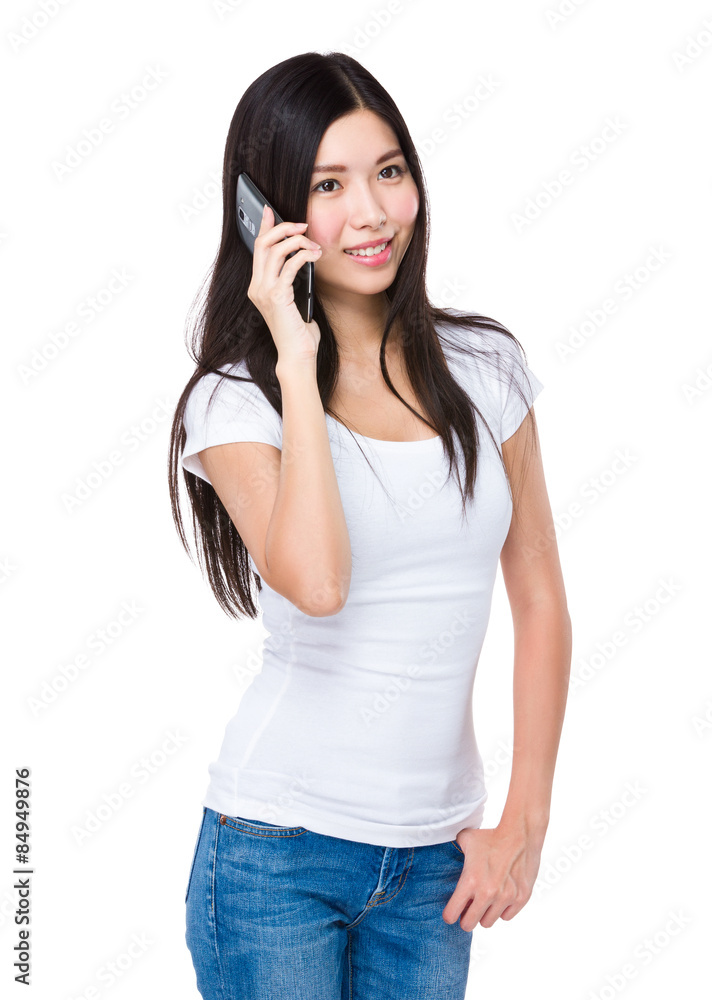 Asian woman talk to cellphone Asian woman talk to cellphone