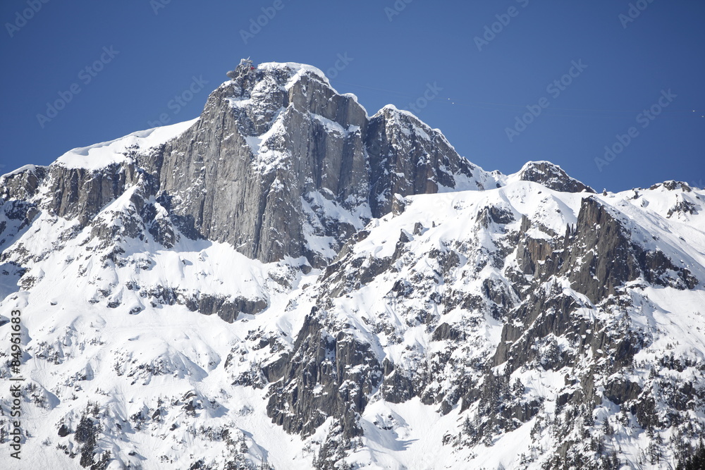 Chamonix - Scenic view of snow covered Mont Blanc with a clear blue sky in the background