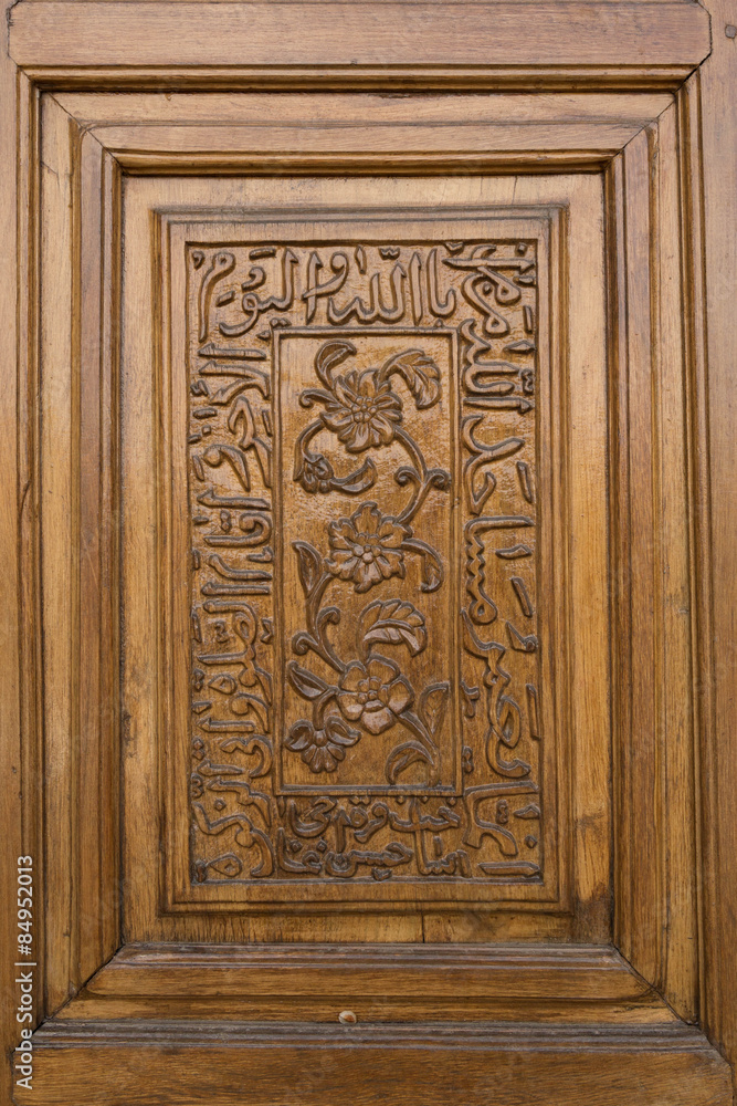 carved door panel in the Kabud mosque in Tabriz, Iran