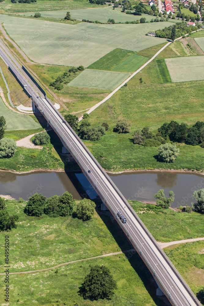 Fototapeta premium aerial view of the the Odra river near Brzeg Dolny town