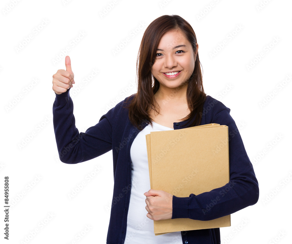 Young girl holding document work and thumb up gesture Young girl holding document work and thumb up gesture
