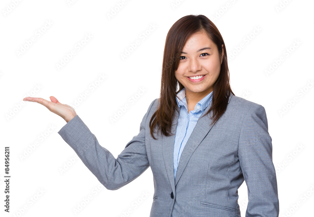 Young businesswoman with open hand palm Young businesswoman with open hand palm