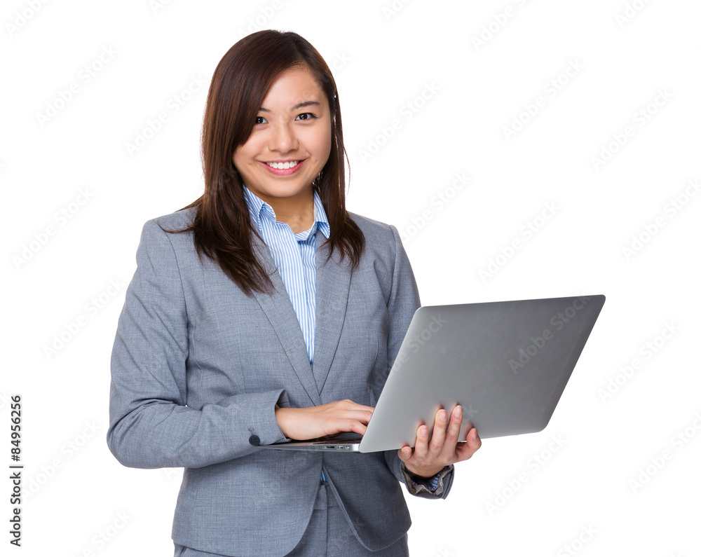 Asian businesswoman use of laptop computer Asian businesswoman use of laptop computer