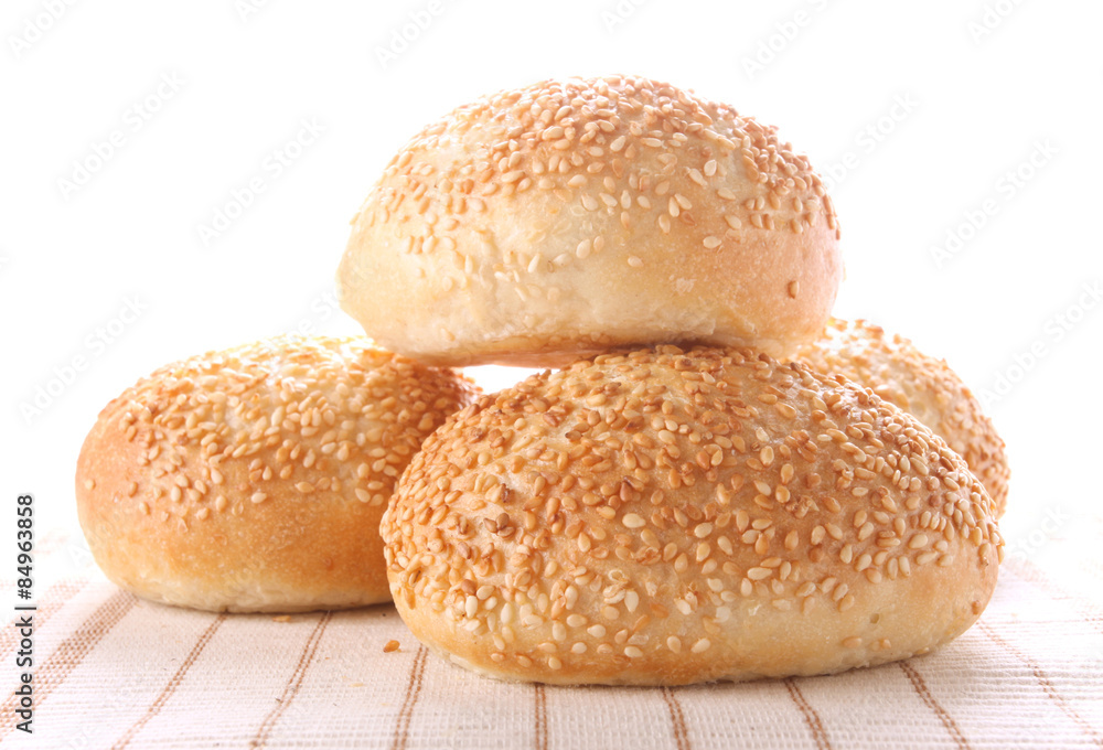 four buns with sesame seeds