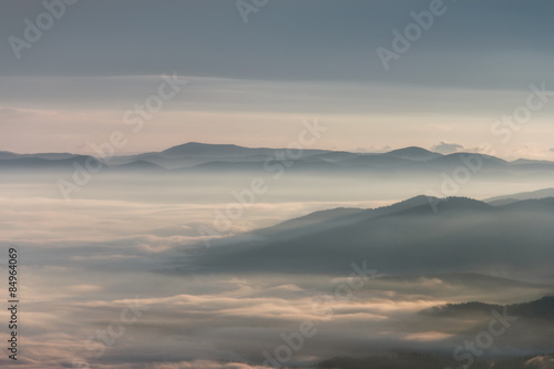 Landscape misty mountains in the morning sunlight. © vovik_mar