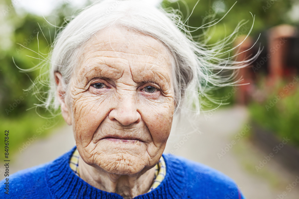 Portrait of an aged woman outdoors Portrait of an aged woman outdoors
