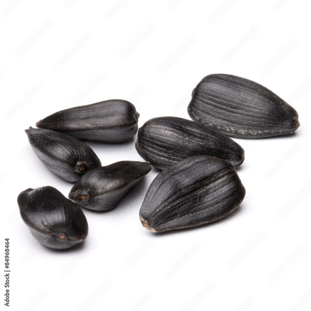 Sunflower seeds isolated on white background close up Sunflower seeds isolated on white background close up