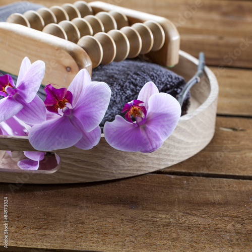 beauty ritual for spa treatment with natural sponge  towel  flowers and massage accessory