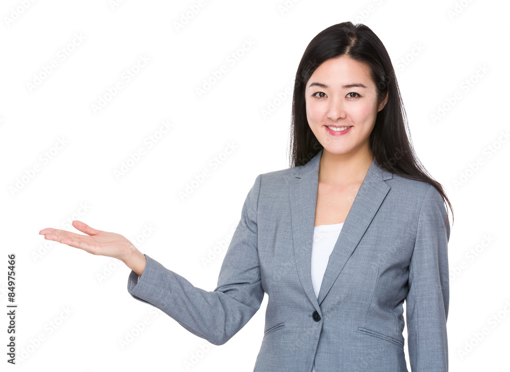 Businesswoman with hand showing something Businesswoman with hand showing something