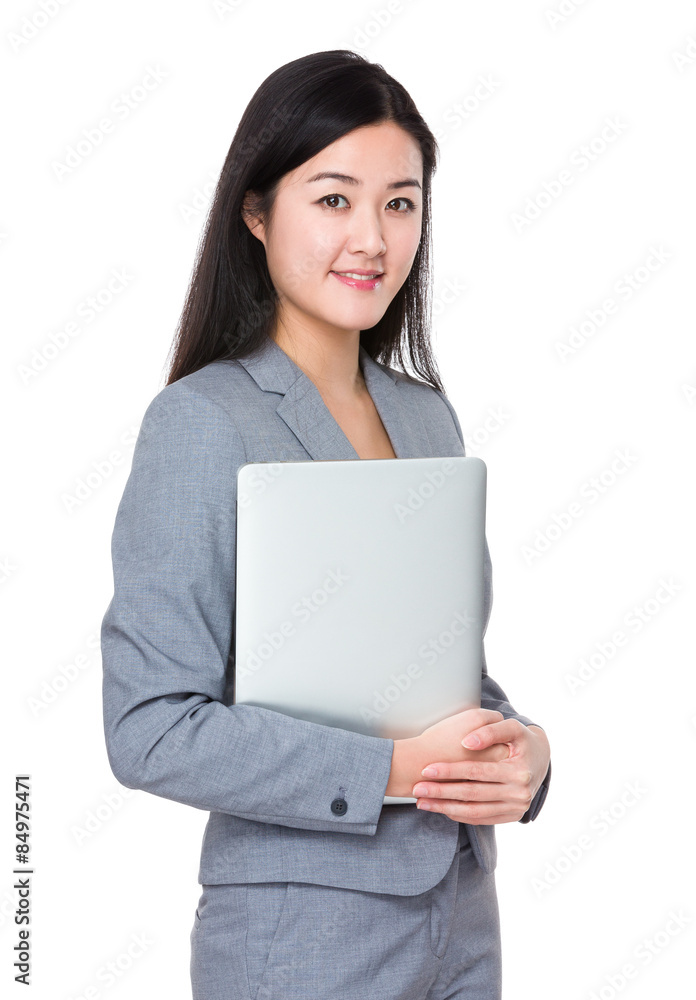 Asian businesswoman hold with laptop computer Asian businesswoman hold with laptop computer
