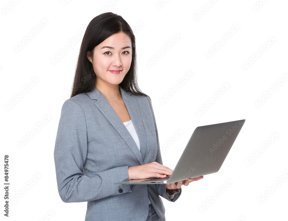 Businesswoman use of laptop computer Businesswoman use of laptop computer