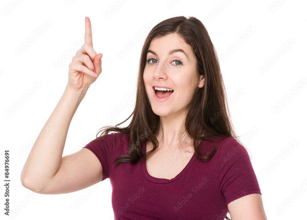 Brunette woman finger point up Brunette woman finger point up