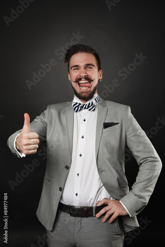 handsome guy with beard and mustache in suit