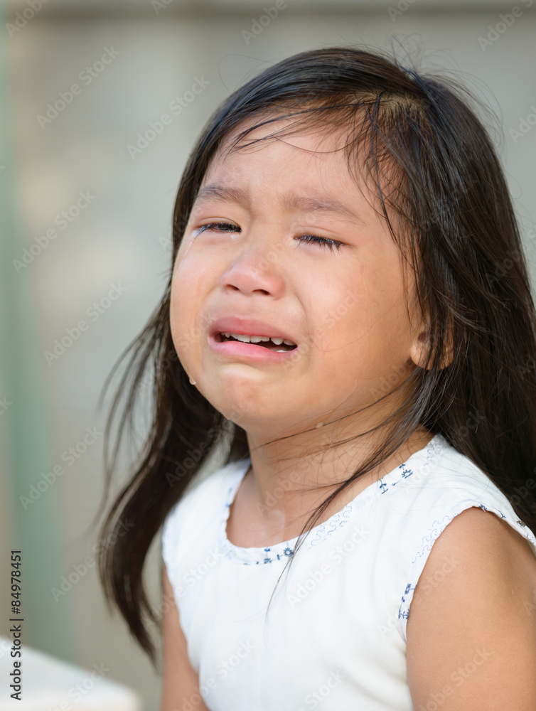 Cute little asian girl crying. Cute little asian girl crying.